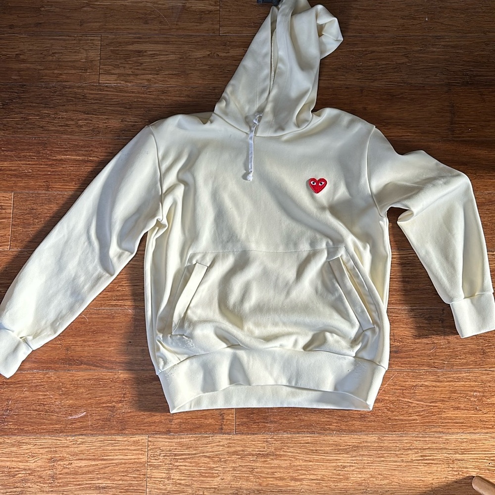Comme des garcons yellow cream colored hoodie.side L